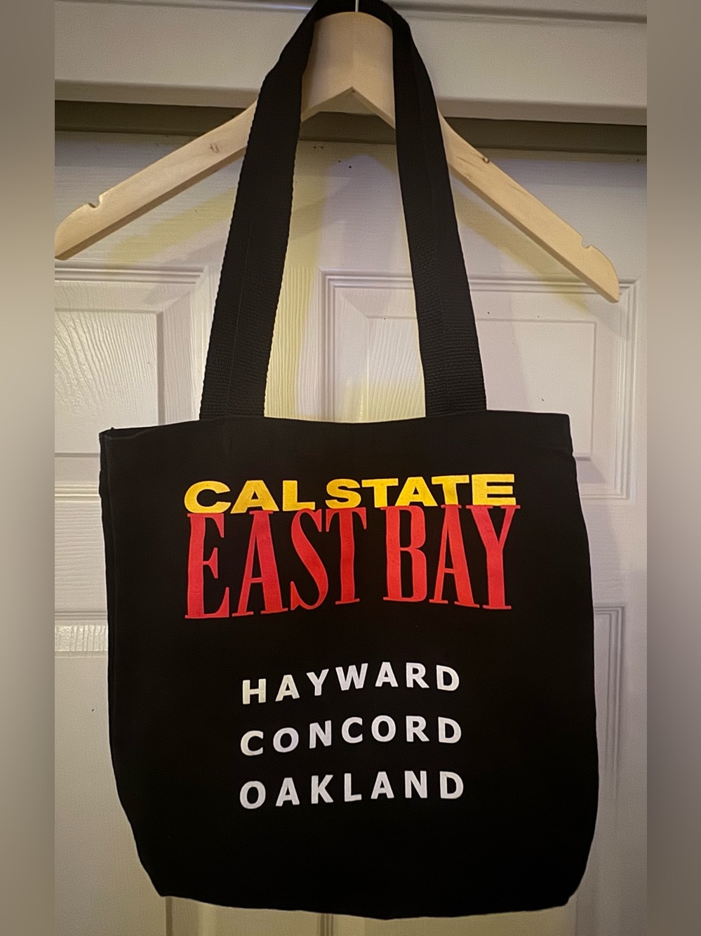 Cal State East Bay Black Tote with Red & Yellow Logo